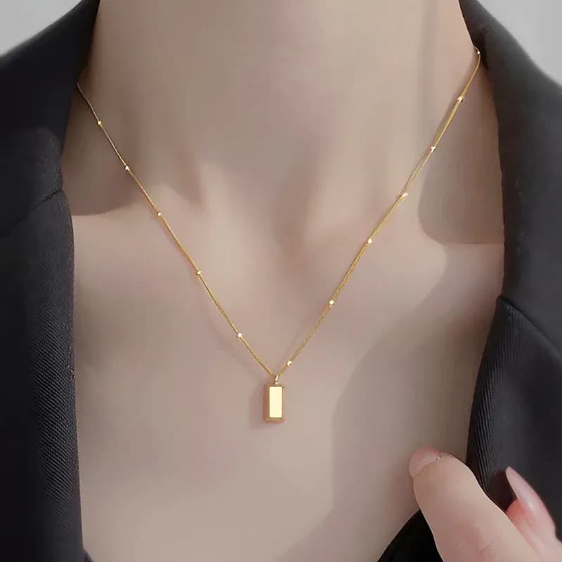 Niyanara Stainless Steel Golden Rectangular Pendant