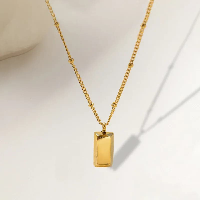 Niyanara Stainless Steel Golden Rectangular Pendant