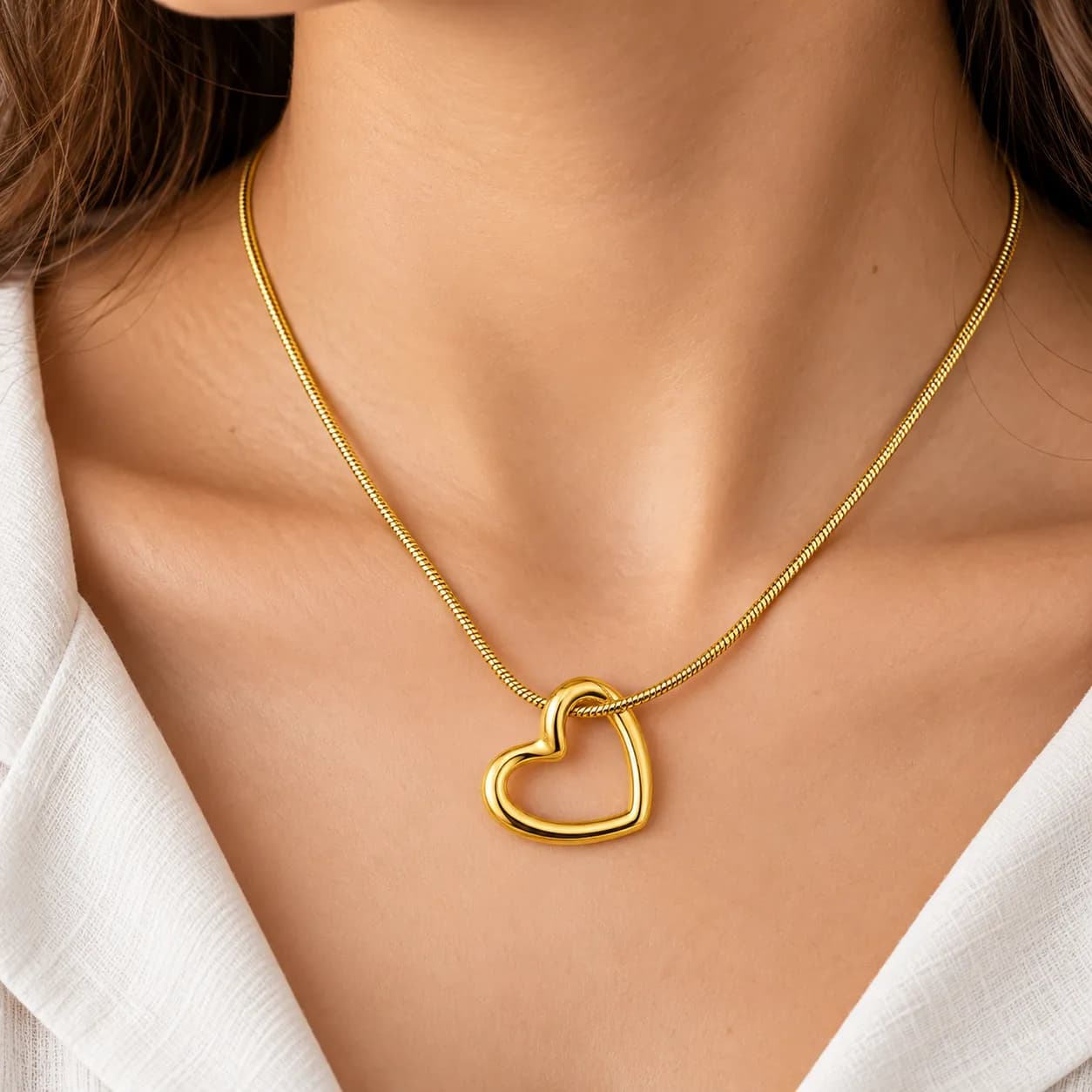 Niyanara 304 Stainless Steel Elegant Gold plated Open Heart Pendant with Neck Chain for Women