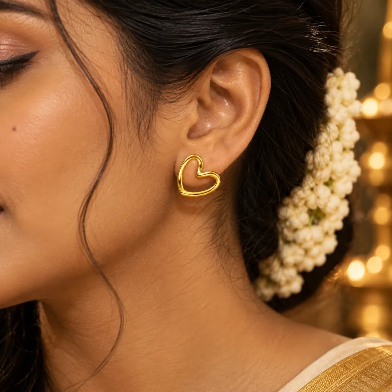 Niyanara Stainless Steel Gold plated Heart Themed Stud Earrings for Women
